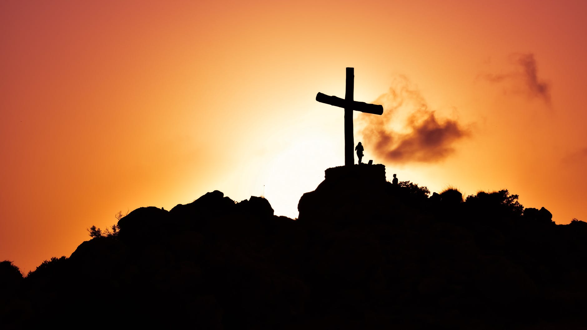 crucifix statue on mountain